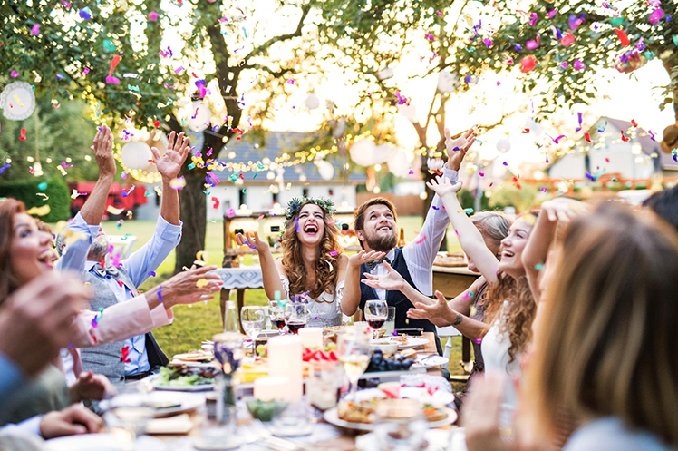 The wedding reception with the guests all around a table