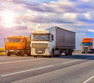 Fleet of commercial trucks on the highway