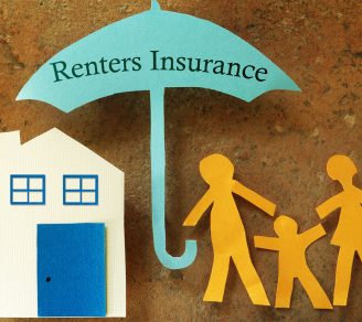 The words “renters insurance” written on a paper cut out of an umbrella.