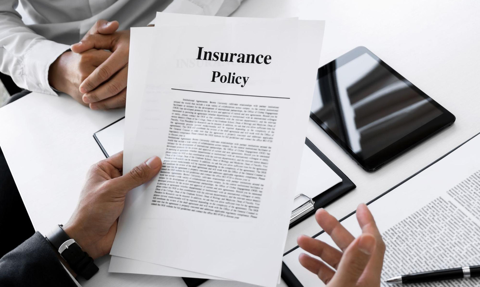 Close-up of an insurance policy document where CGL exclusions can be found