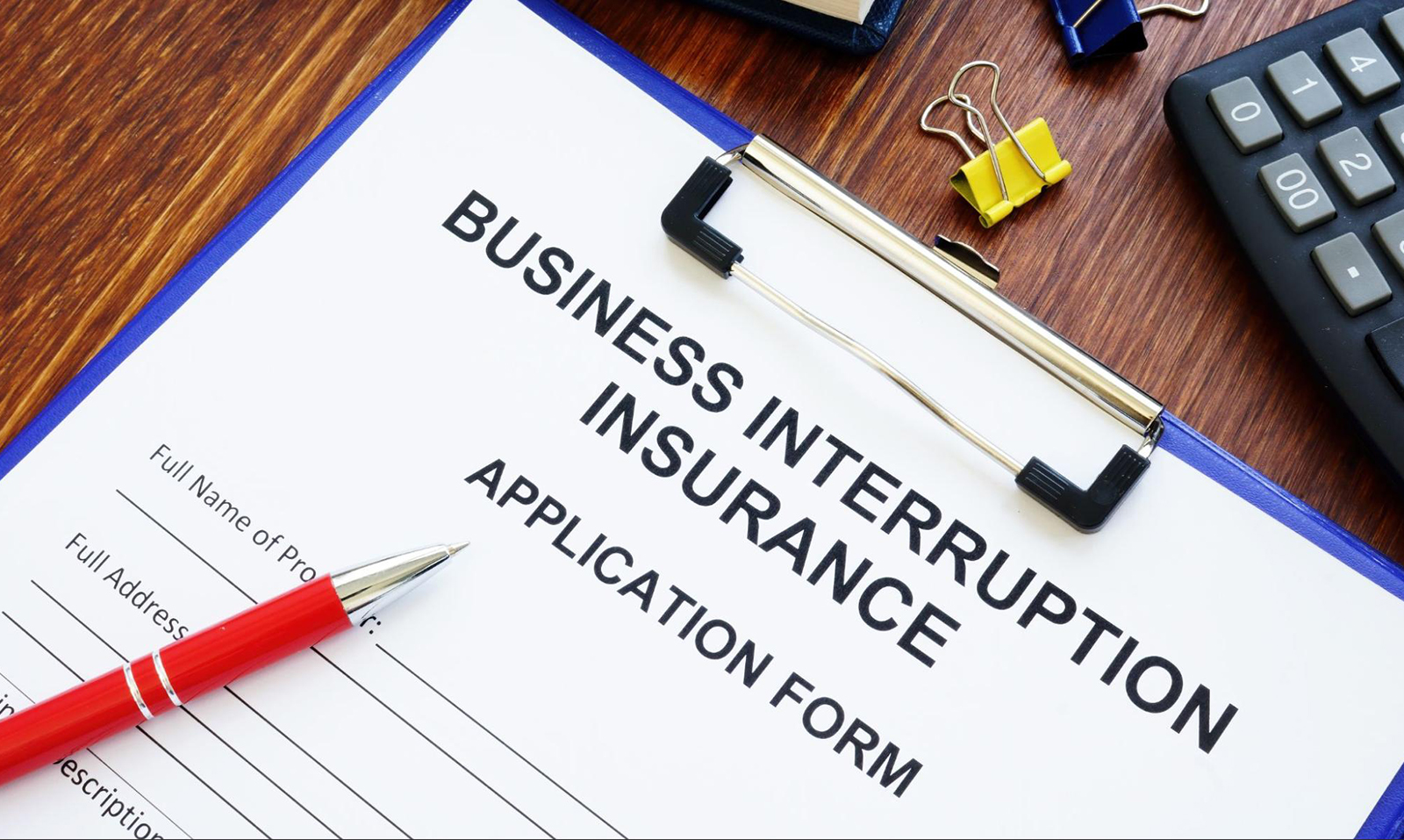 Close-up of an application form for business interruption insurance for contractors