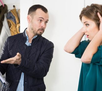 An upset landlord showing a document amidst a landlord and tenant dispute