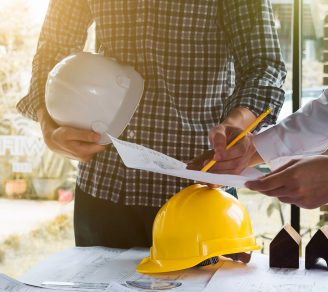 A construction worker receives insurance support from an expert at KASE