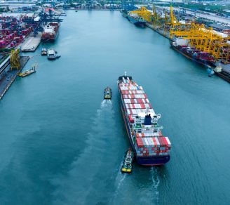 A cargo ship about to dock at its seaport