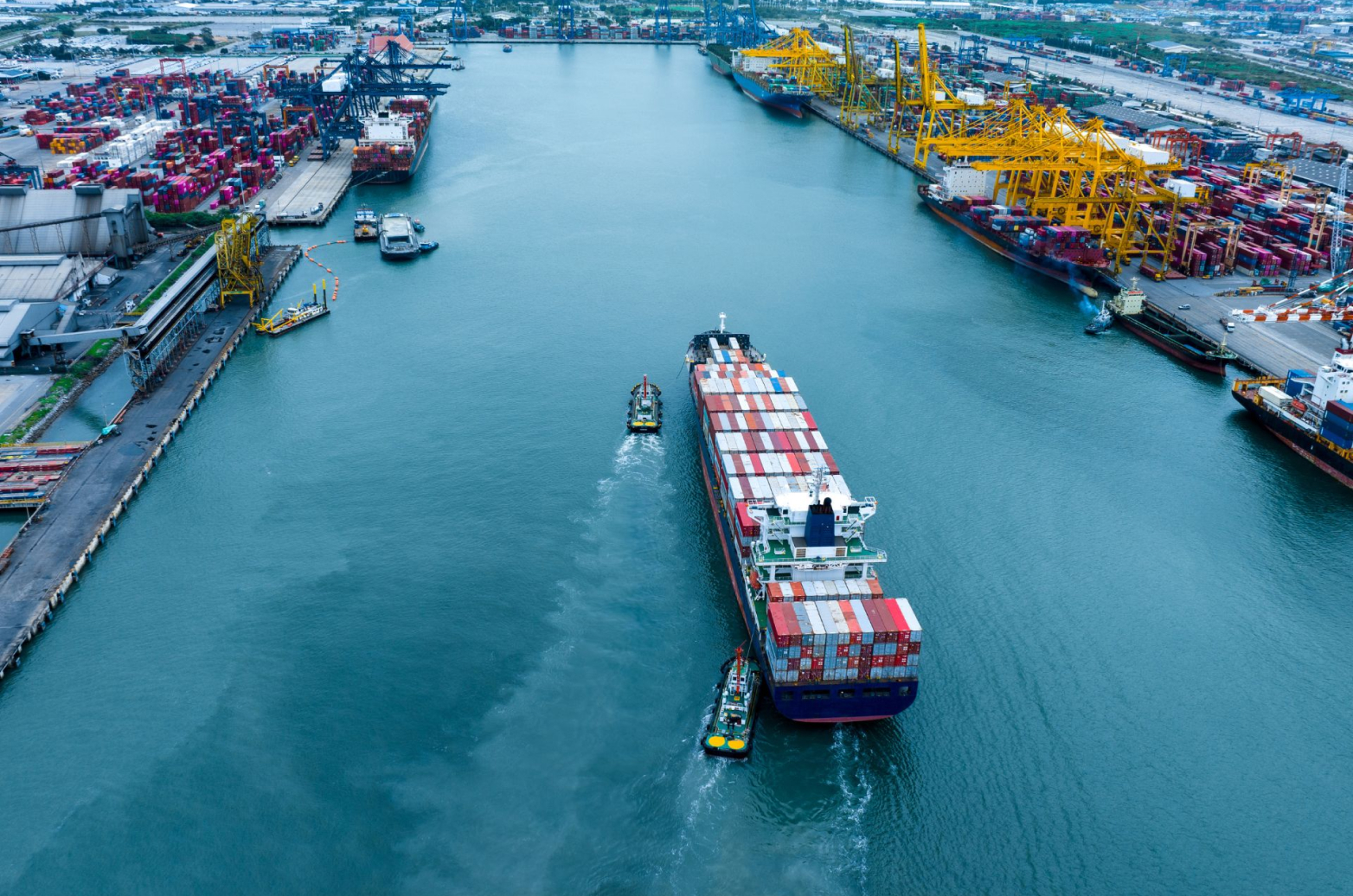 A cargo ship about to dock at its seaport