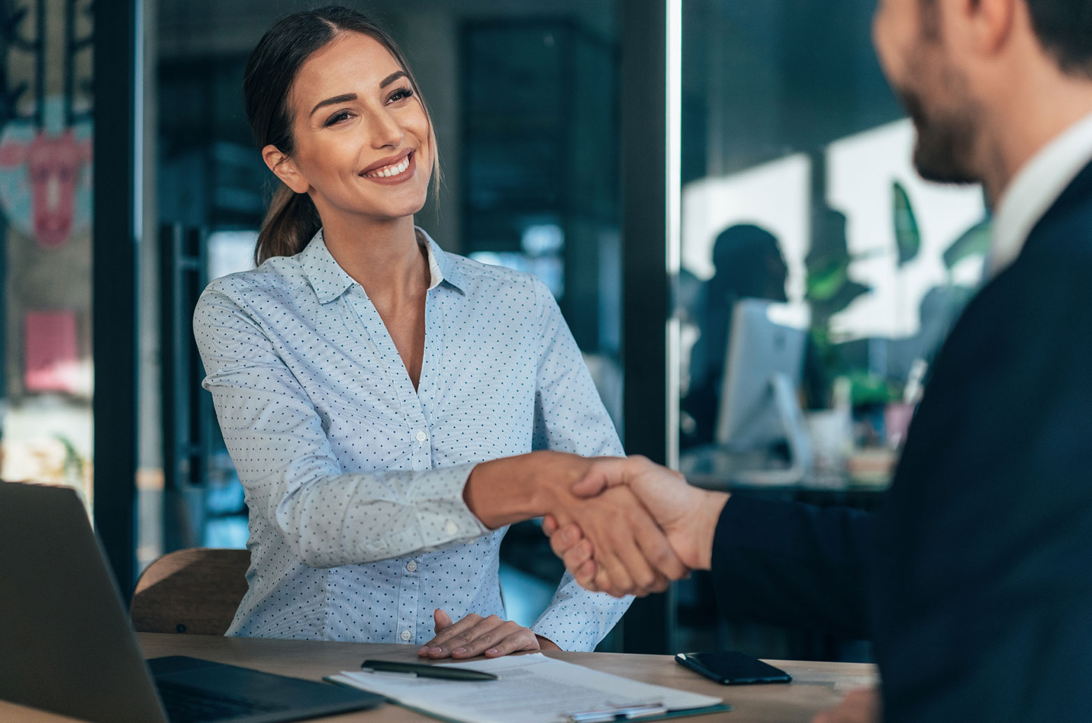 Business people shaking hands