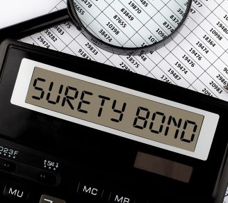 Calculator showing the words Surety Bond in digital-looking text.