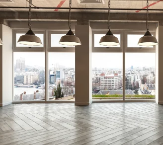 A vacant commercial space overlooking a city